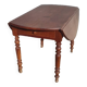 Table ronde ancienne extensible en bois fruitier avec côtés rabattables