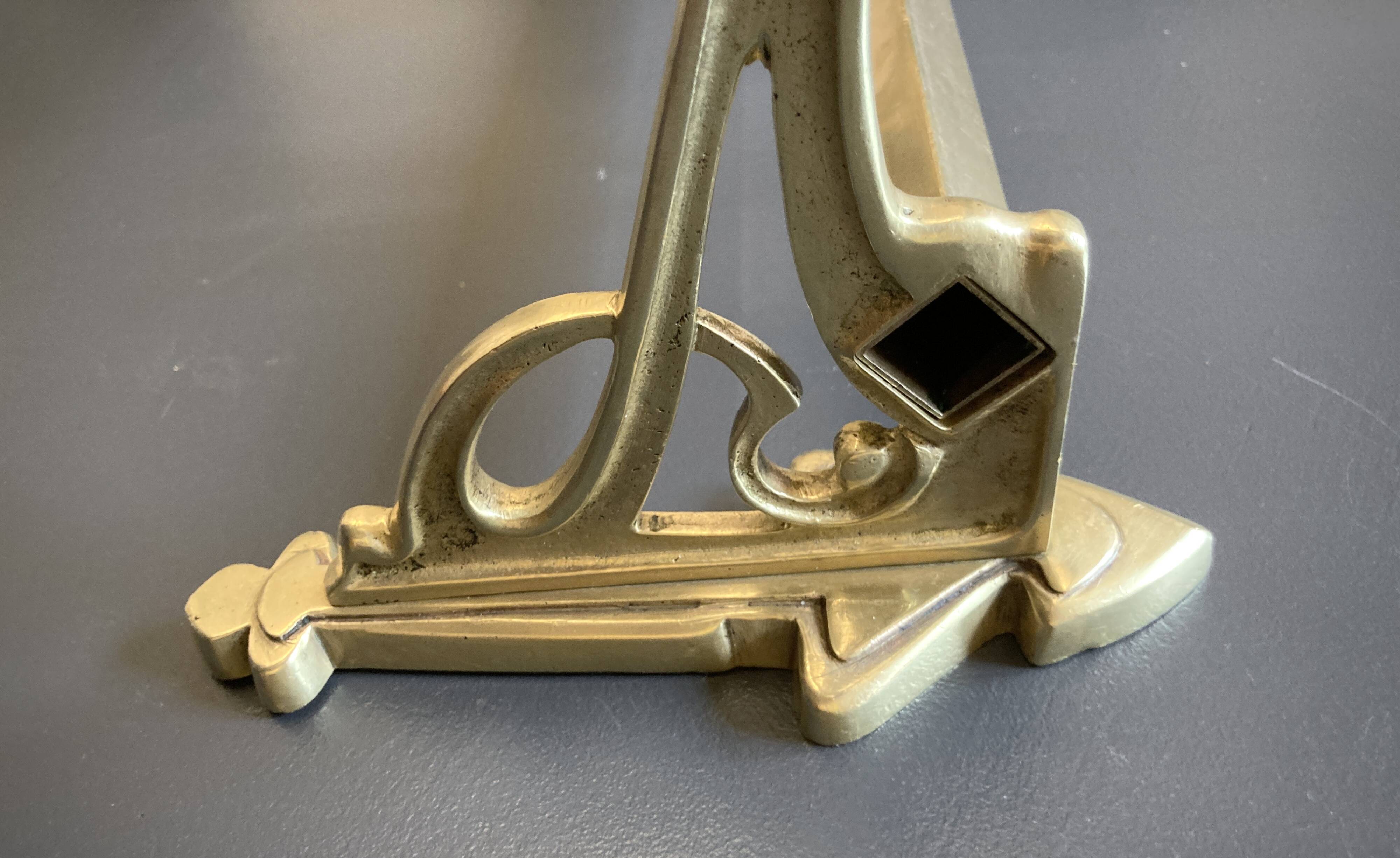 Art-deco wall-mounted coat rack in brass