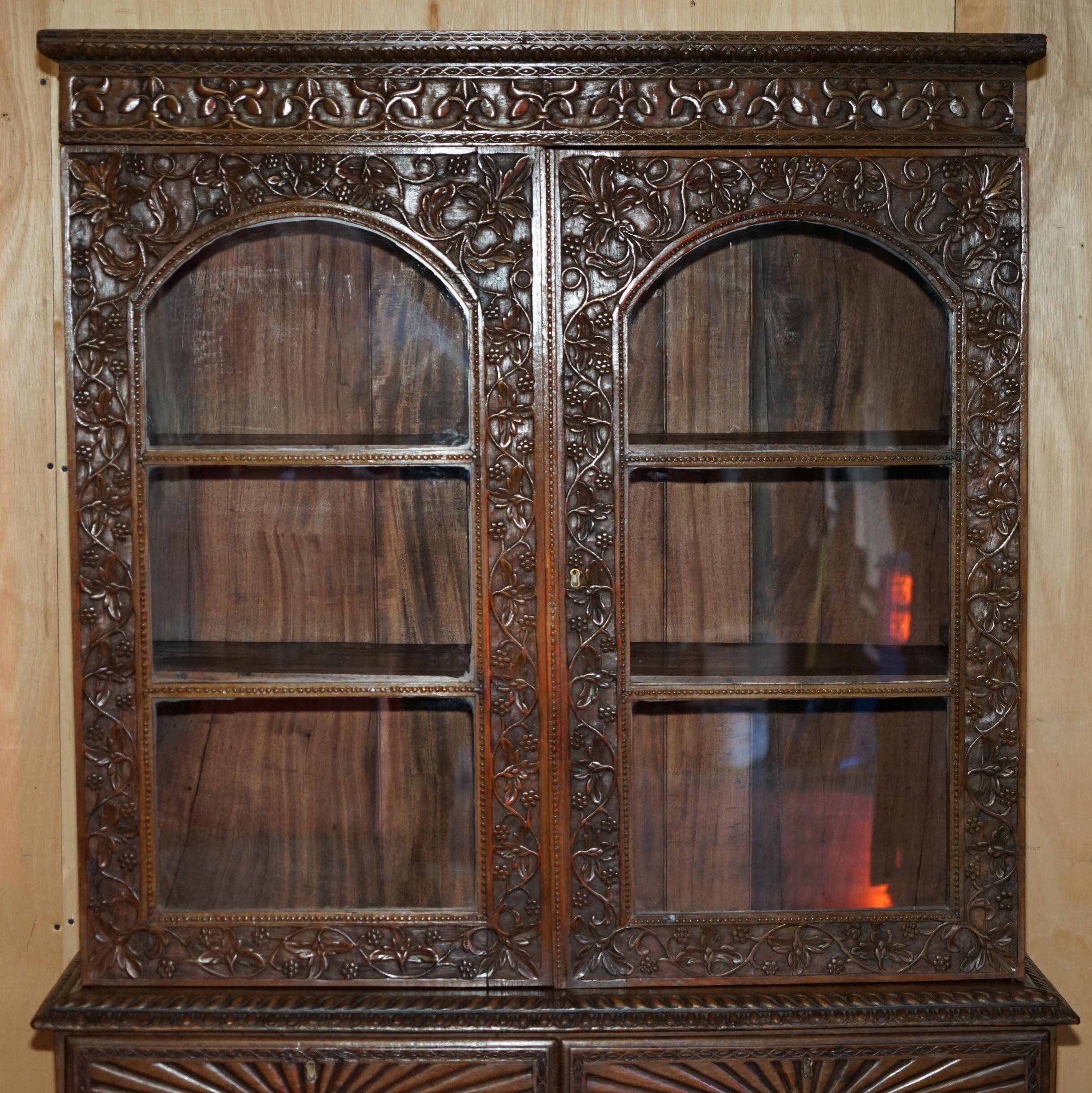 19th-century Anglo-Indian colonial hardwood library on a chest of drawers.