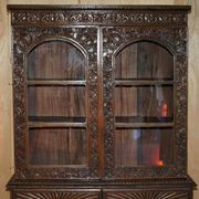 19th-century Anglo-Indian colonial hardwood library on a chest of drawers.