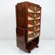 An Art Deco chest of drawers with five beech and rosewood drawers.