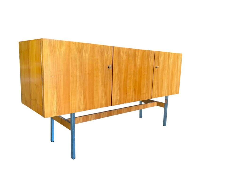 Vintage wooden storage cabinet with chrome legs