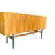 Vintage wooden storage cabinet with chrome legs
