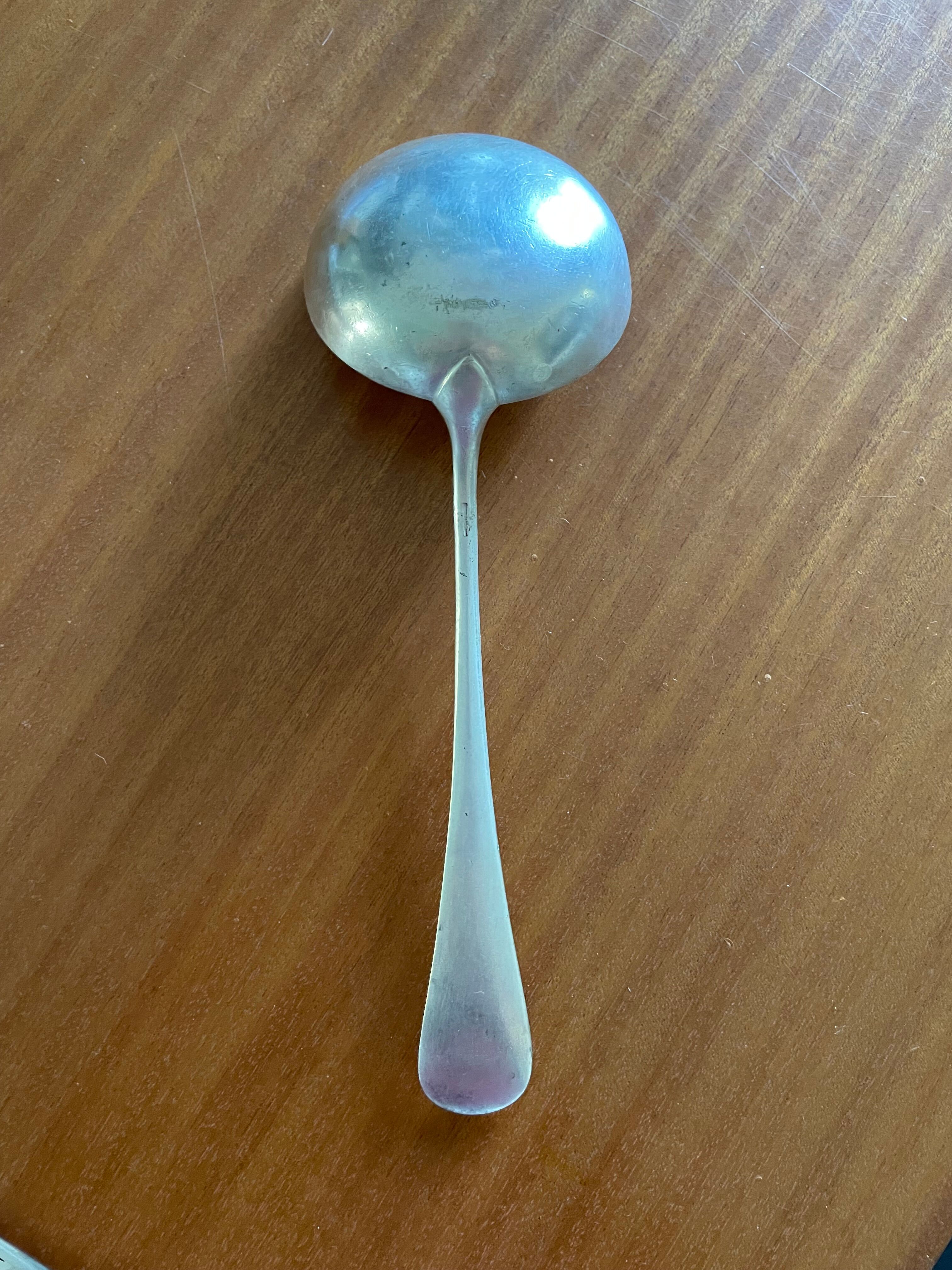 Silver metal ladle