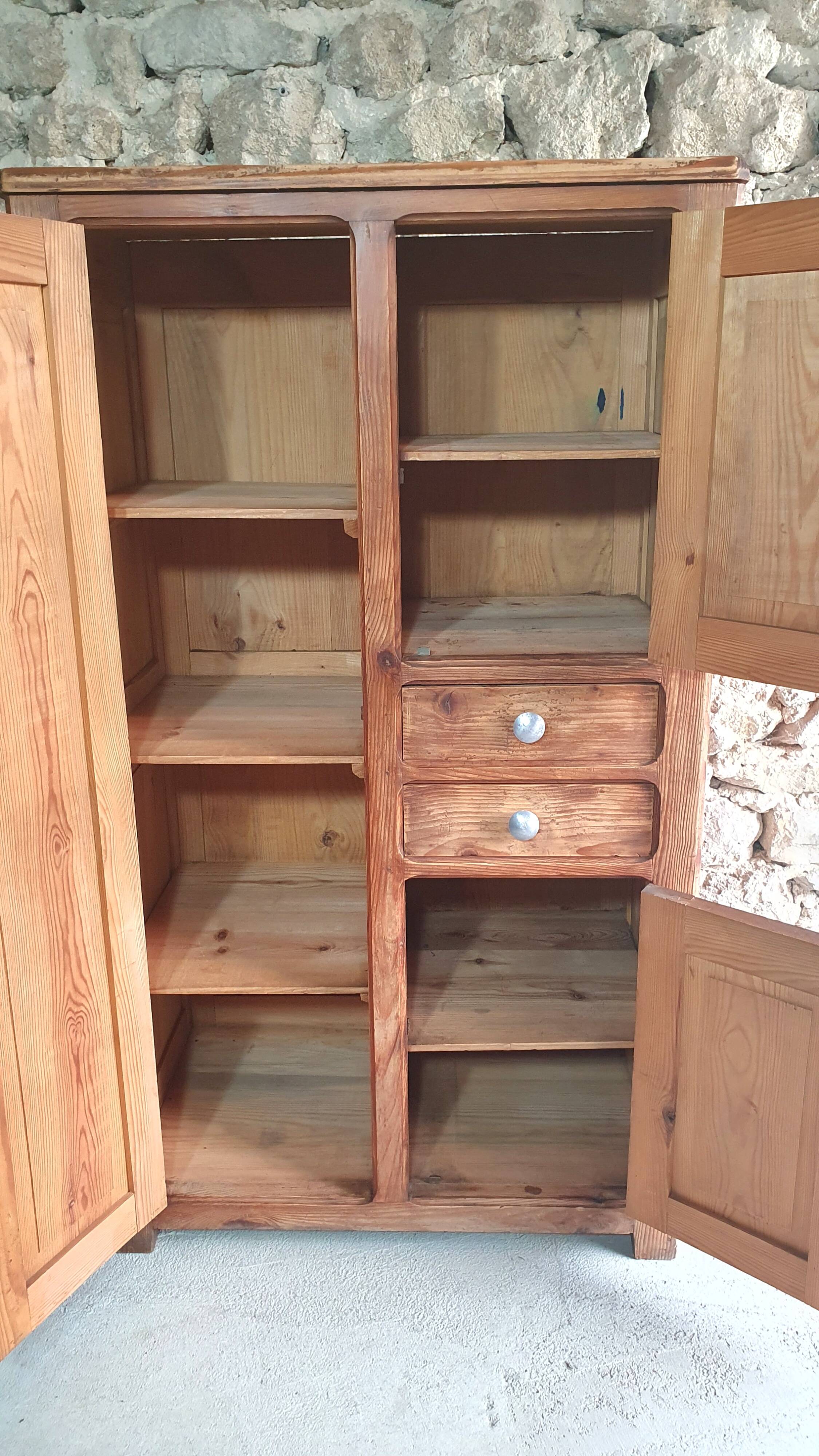 Small cabinet made of raw wood
