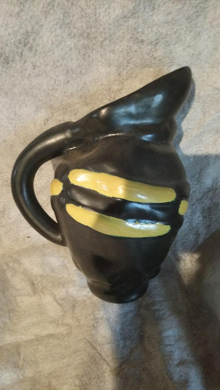 Yellow and Black ceramic pitcher