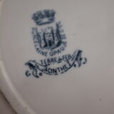 Assiette Terre de fer signée Gien