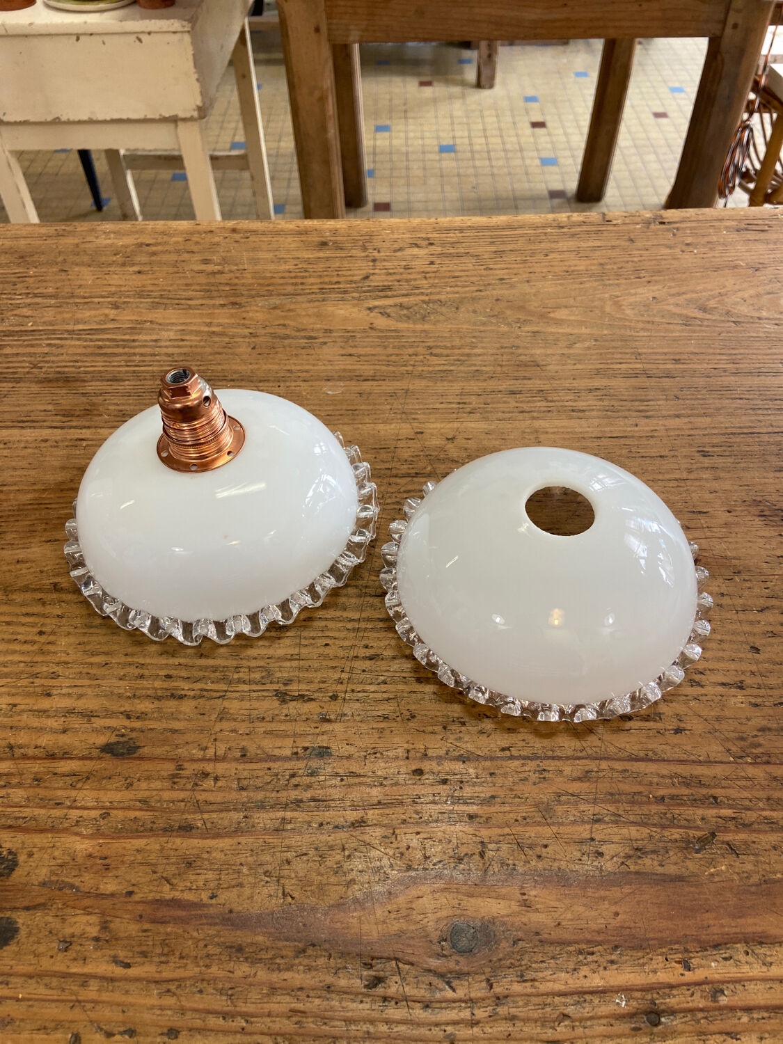 Pair of white glass pendant lights