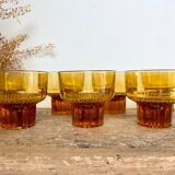 7 small amber glasses