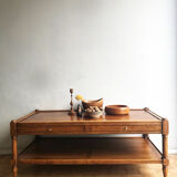 A solid wood-marked coffee table.