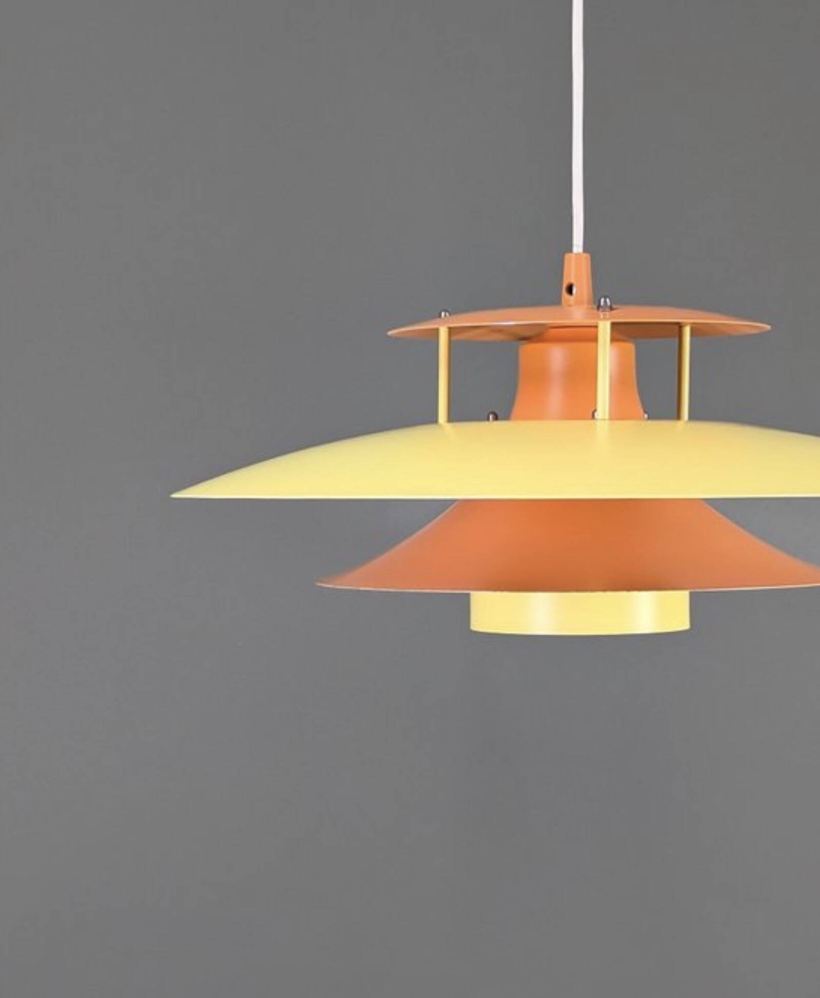 Vintage Danish metal pendant light in orange and yellow – 1970s