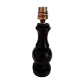 Lampe en bois noir signé