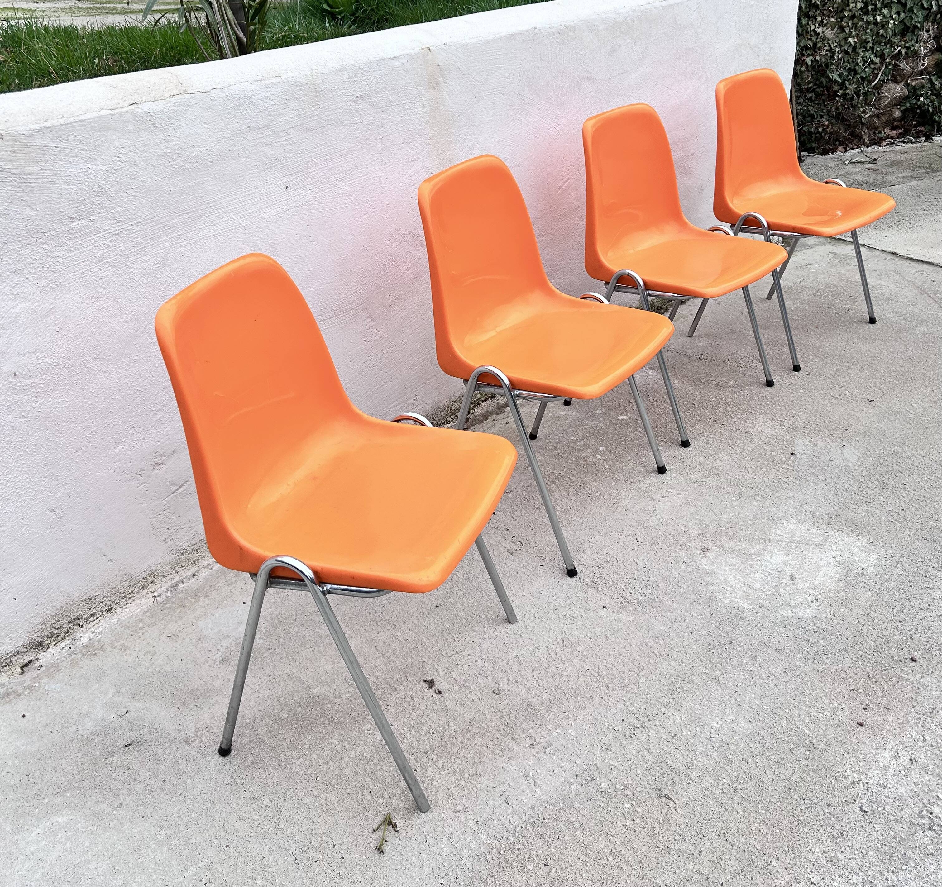Orange plastic chairs