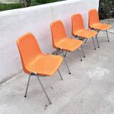 Orange plastic chairs
