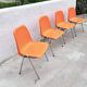 Orange plastic chairs