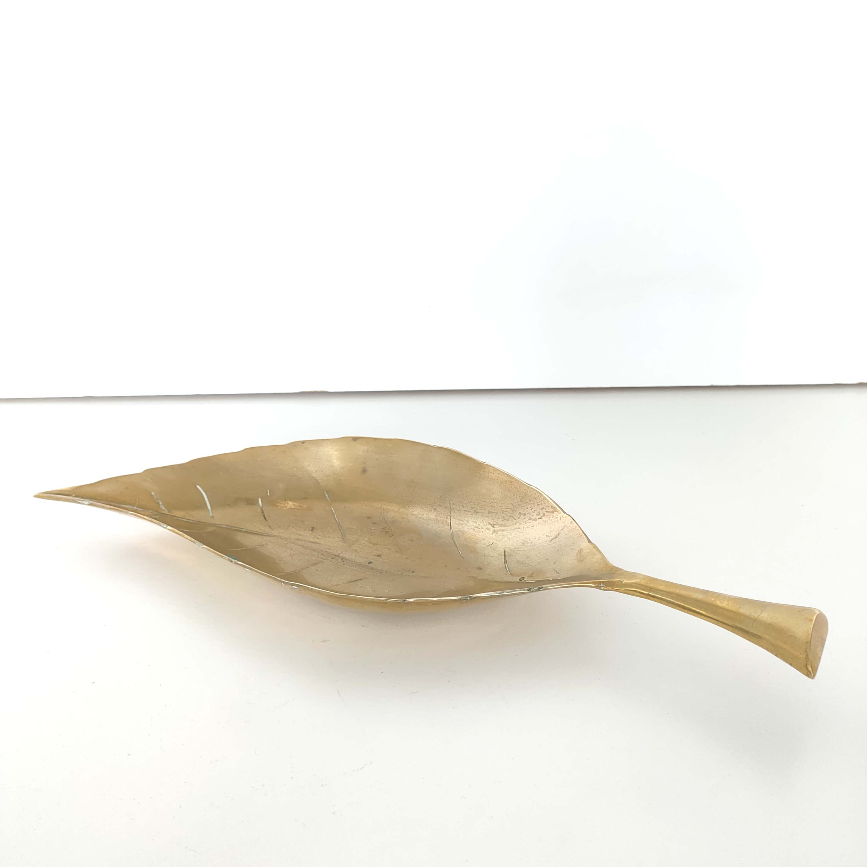 Empty brass leaf pocket