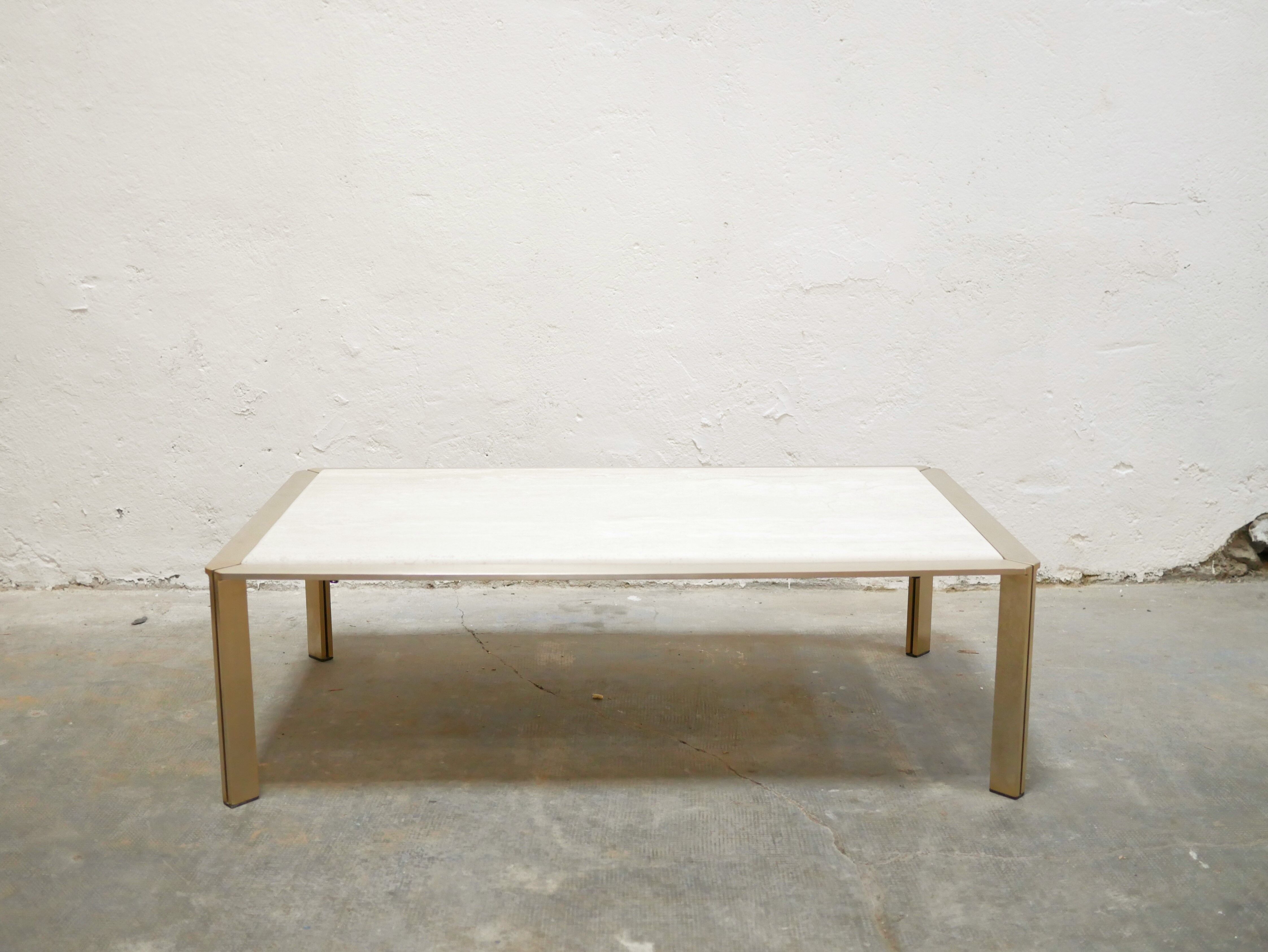 Vintage coffee table in travertine and brass