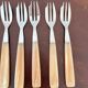 Lot de 12 fourchettes vintages et étui
