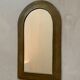 Bronze arch mirror