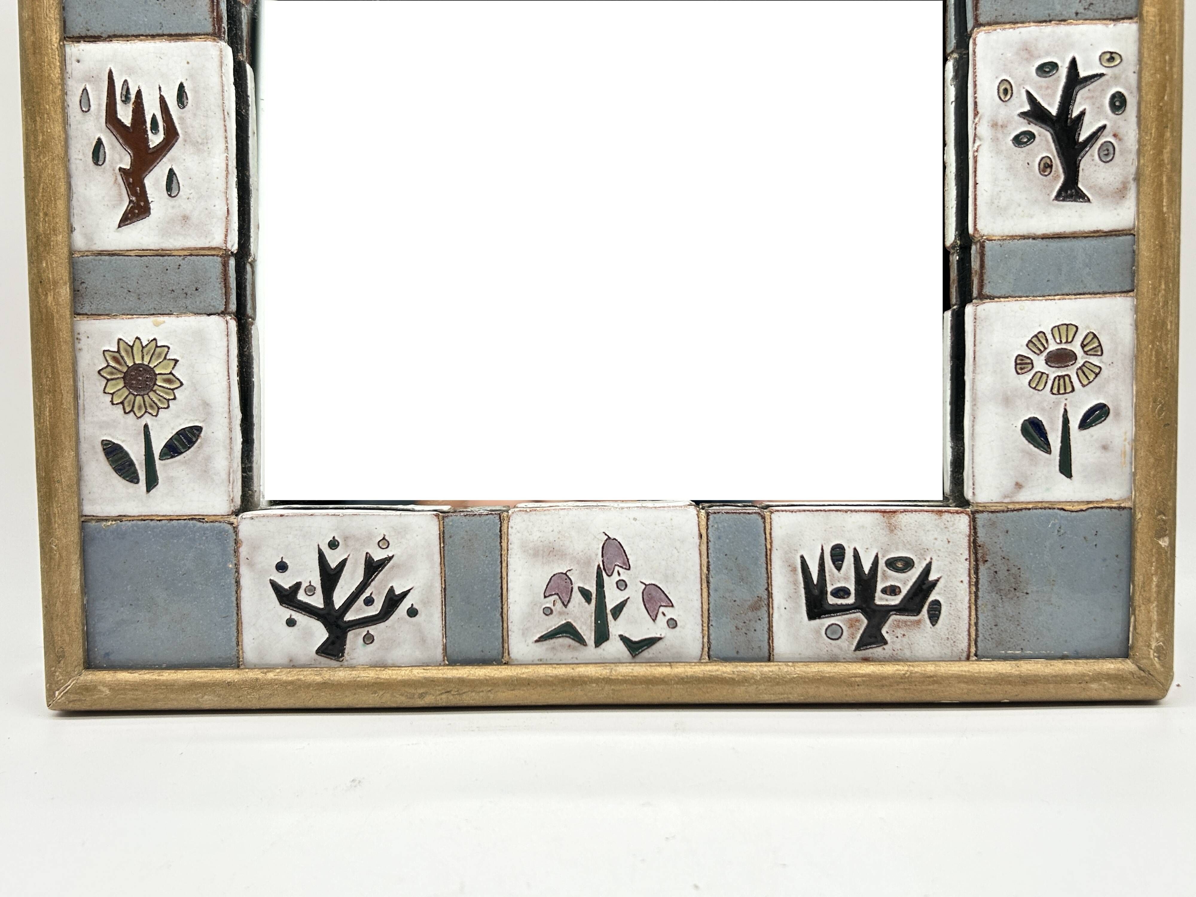 Ceramic enamelled mirror in the style of Odette Dijeux.
