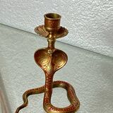 Chiseled brass cobra candlestick