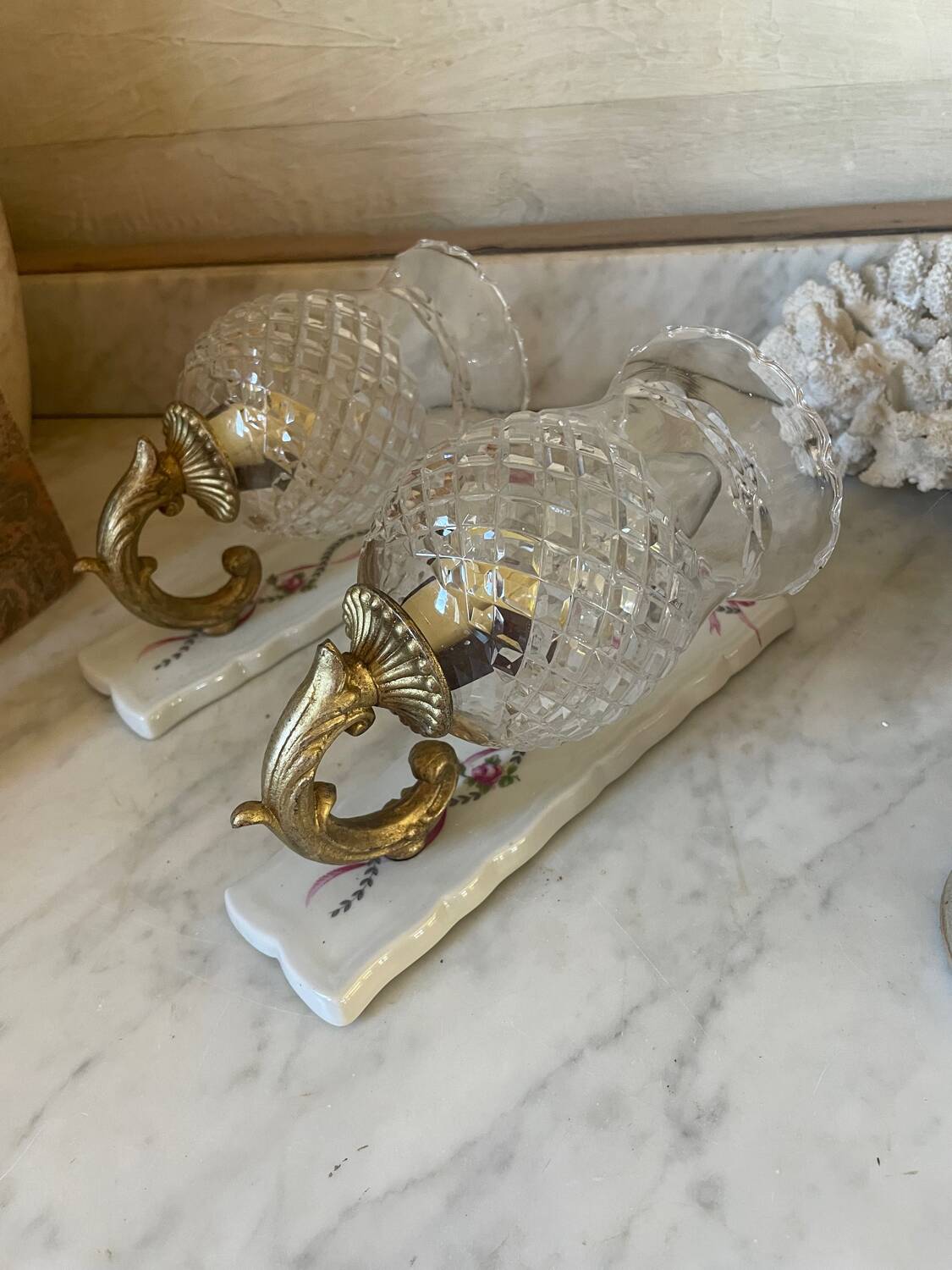 Pair of cut glass and Limoges porcelain wall sconces