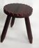 tabouret tripode au charme brut
