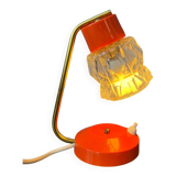 Small orange desk lamp with clear crystal glass shade
