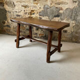 Small rustic table made of solid wood.