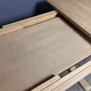 Oval extendable dining table in beech with Danish design.