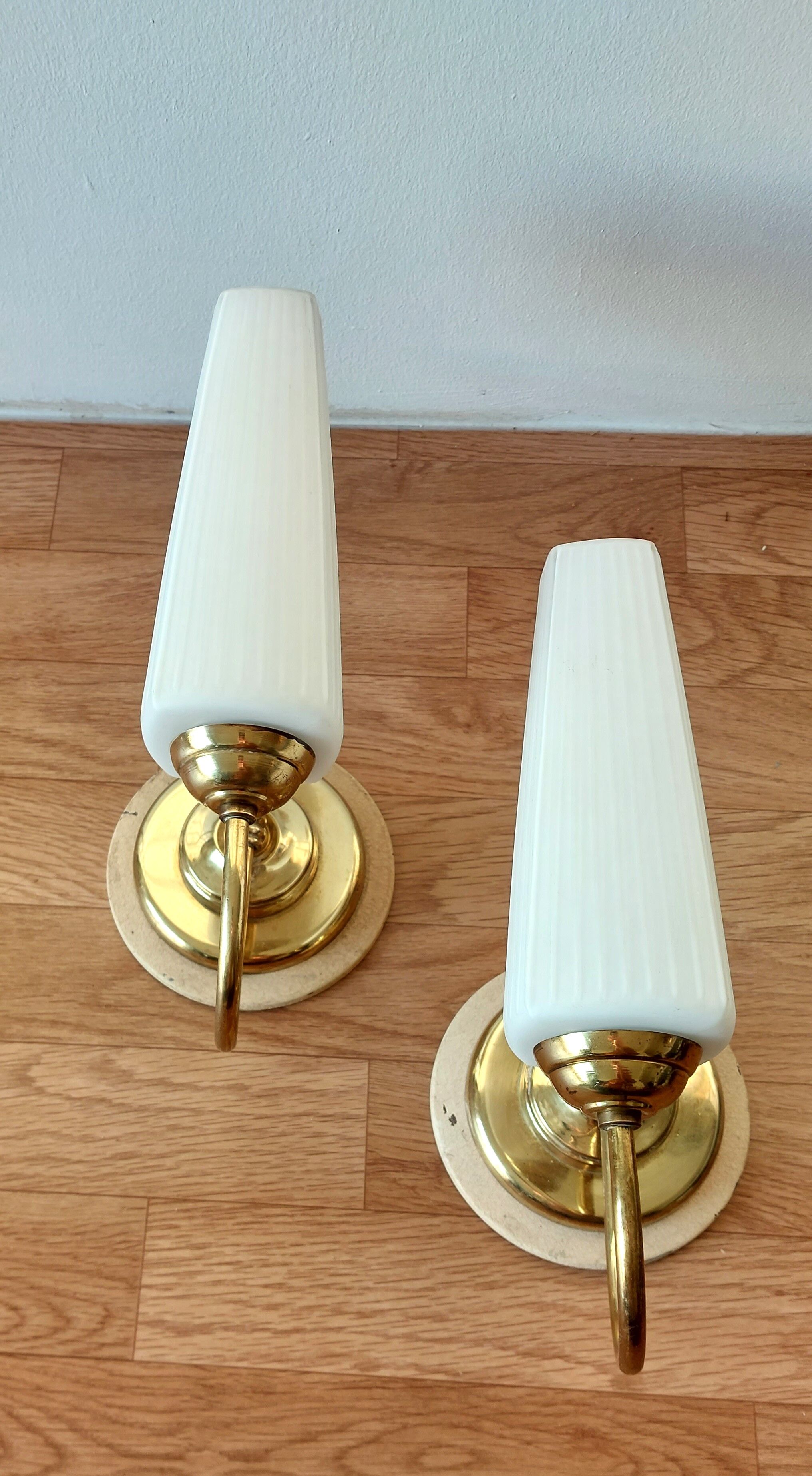 Pair of sconces with a light arm, brass and white opaline 1960.