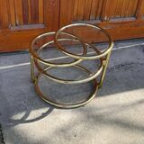 1970s swivel coffee table in gilded brass and glass, Milo Baughman style, vintage design.