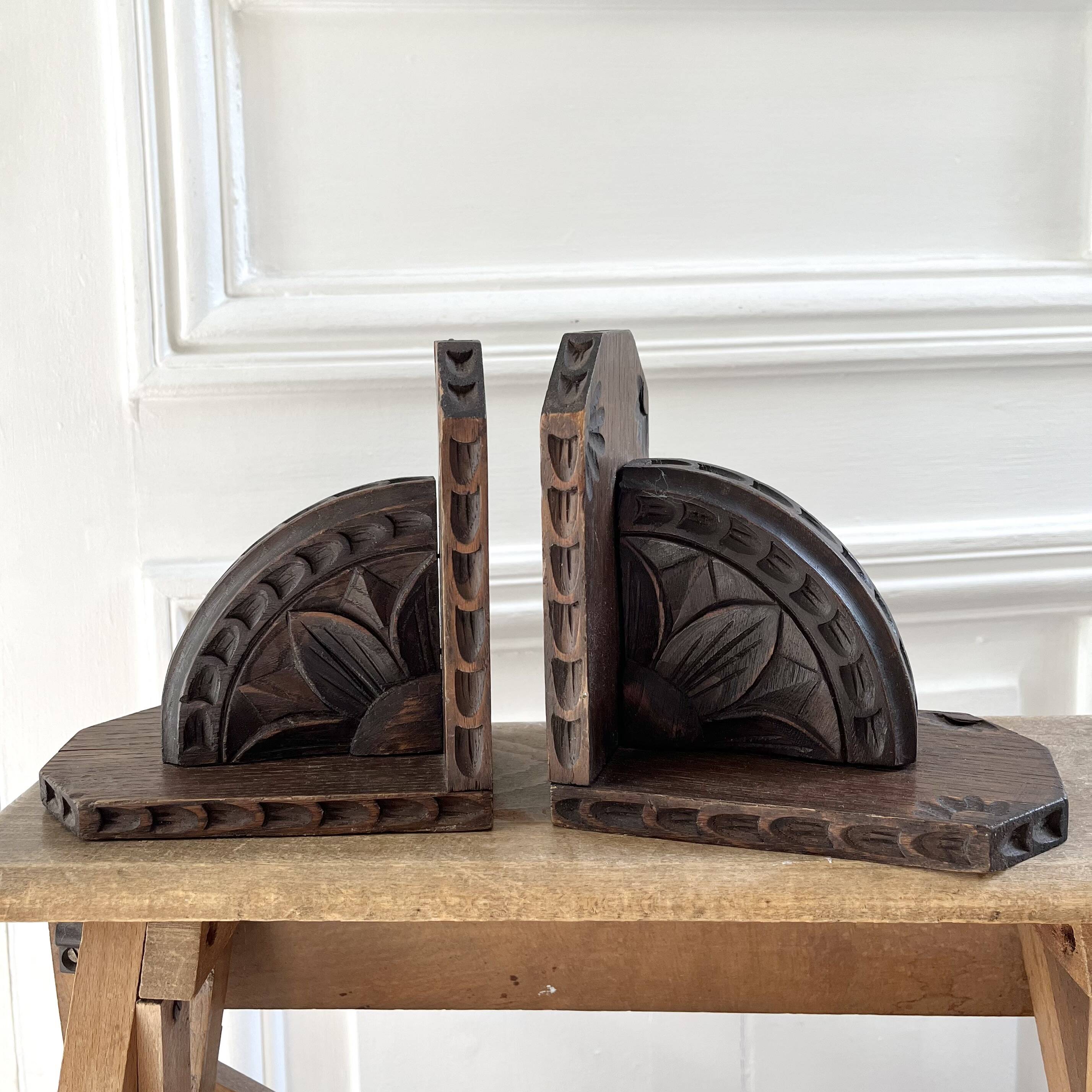 Pair of carved wooden bookends