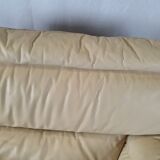 Fauteuil avec pouf en cuir et daim