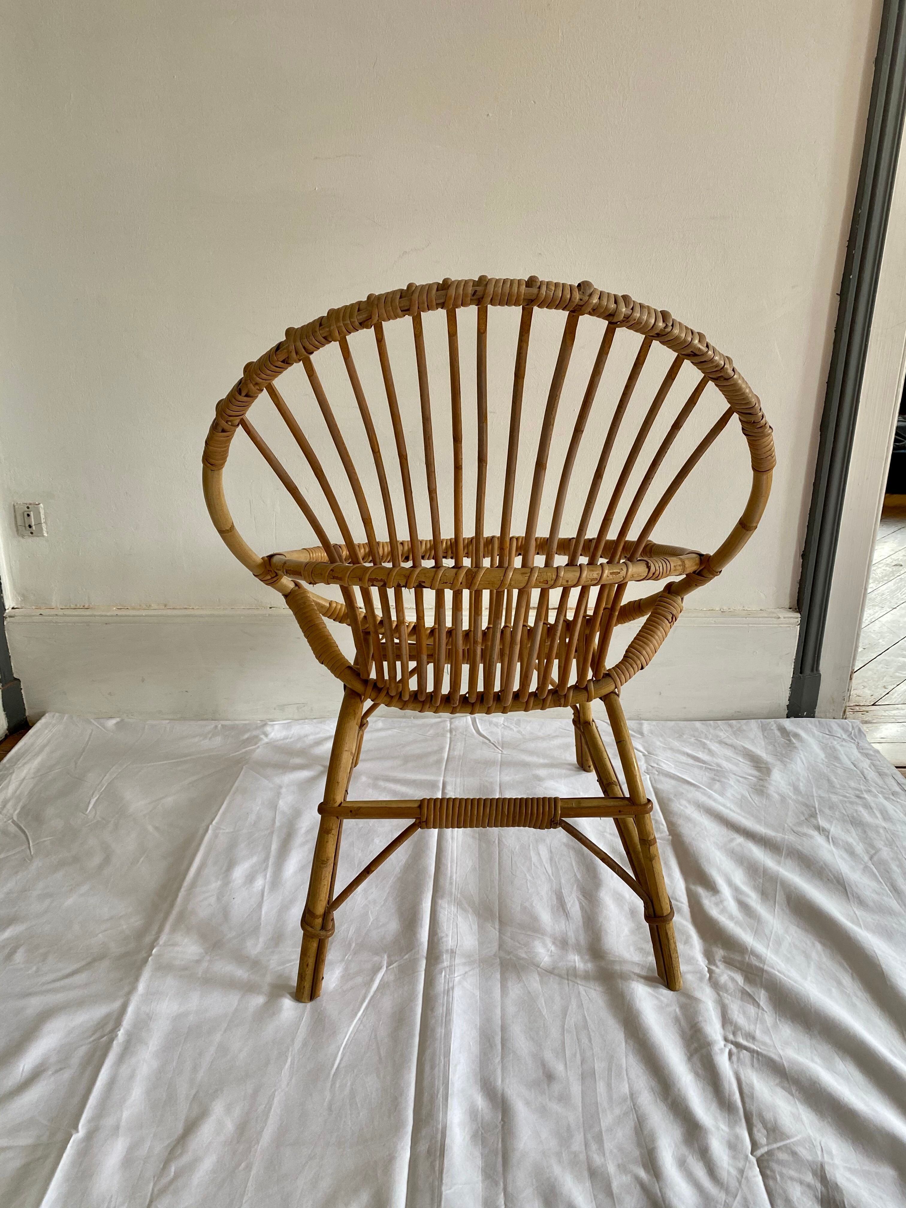 Adult-sized rattan shell chair