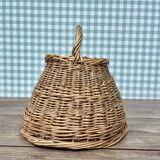 Round basket with vintage rattan handle
