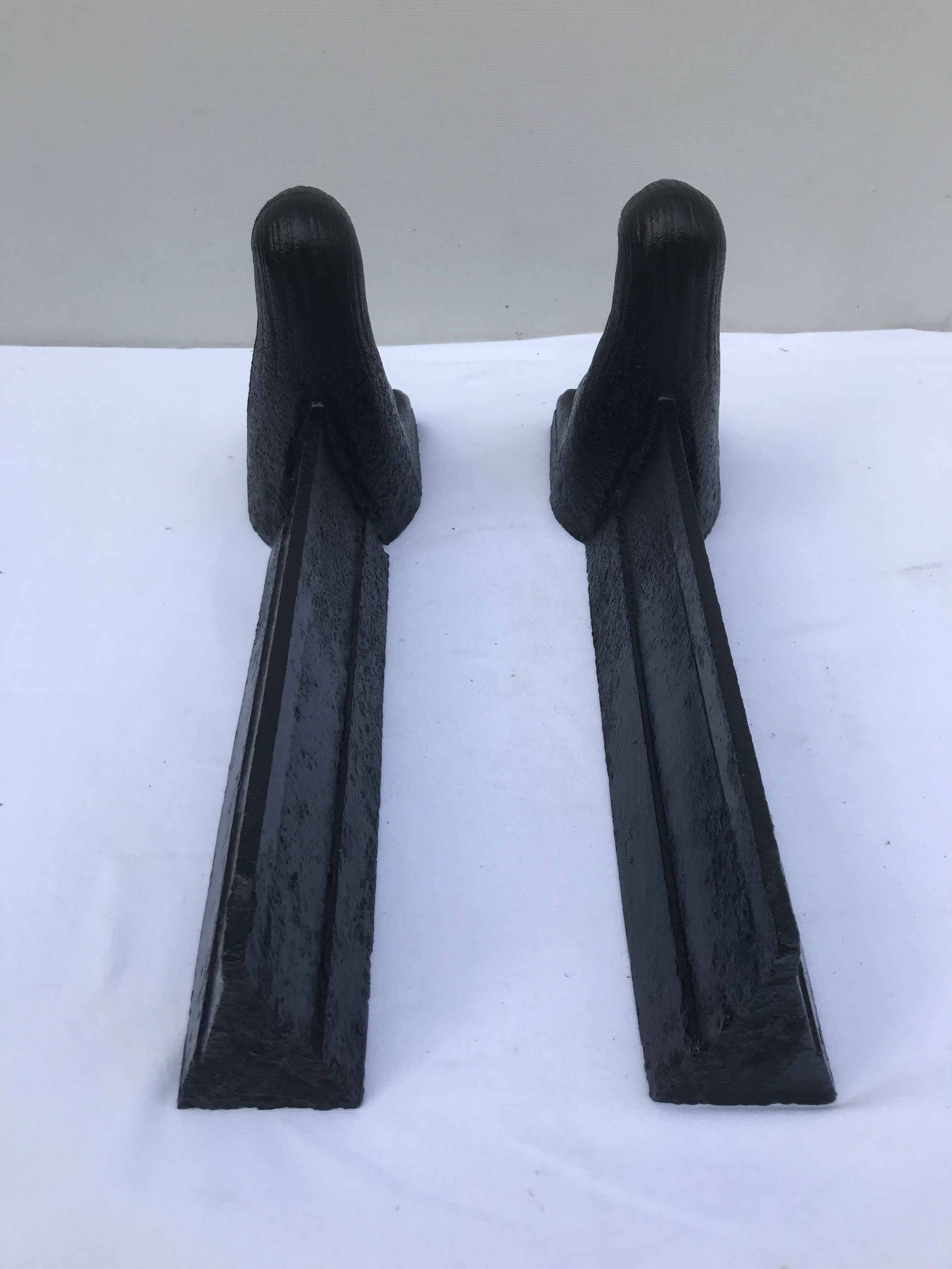 Former Egyptian cast-iron chenet in vintage black metal