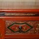 Vintage Chinese lacquered buffet decorated with gold leaf.