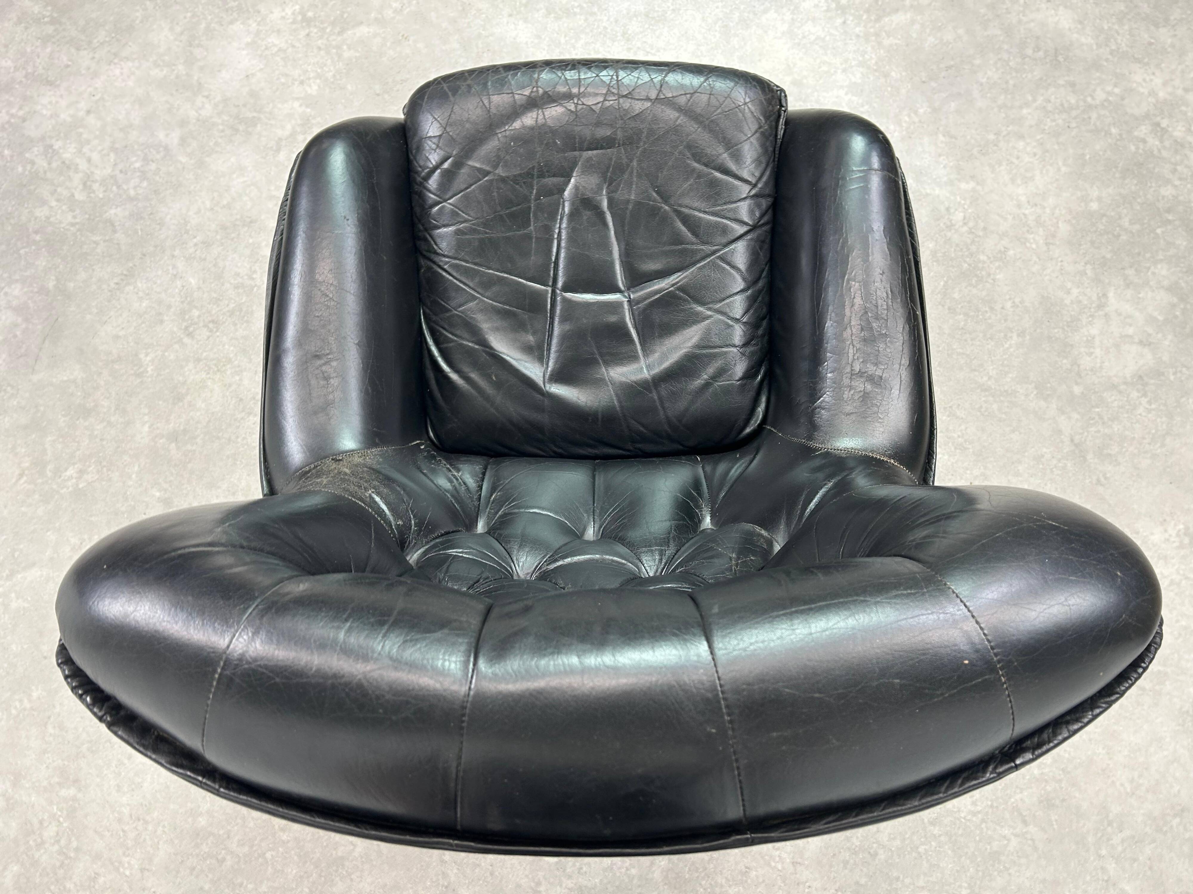 Black leather wingback swivel chair by PeeM