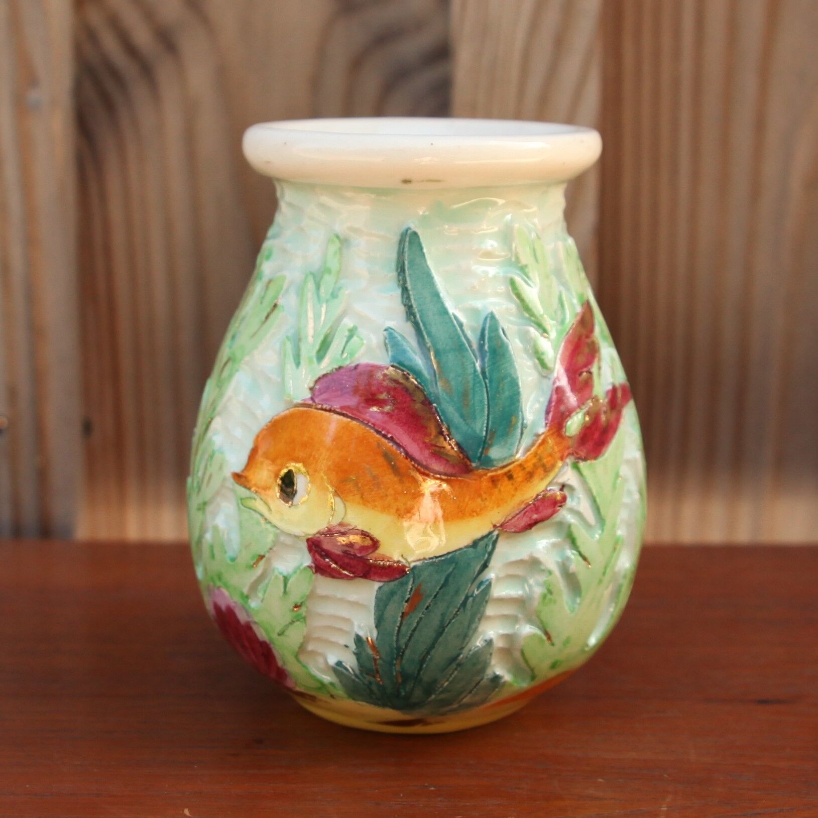 Ceramic vase decorated with fish