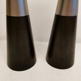 Two table lamps made of dark-stained wood with silver detail in the middle.