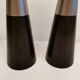 Two table lamps made of dark-stained wood with silver detail in the middle.