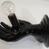 Paire d’appliques mains noires tenant un globe en opaline, années 70