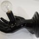 Pair of vintage 1970s wall sconces – Black hands holding an opaque globe