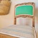 Renovated antique chair – carved wood and green backrest