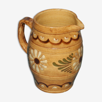 Glazed terracotta pitcher decorated with friezes and flowers