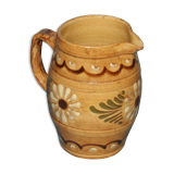 Glazed terracotta pitcher decorated with friezes and flowers