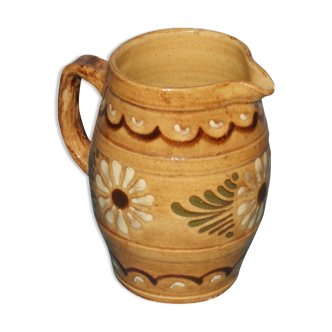 Glazed terracotta pitcher decorated with friezes and flowers