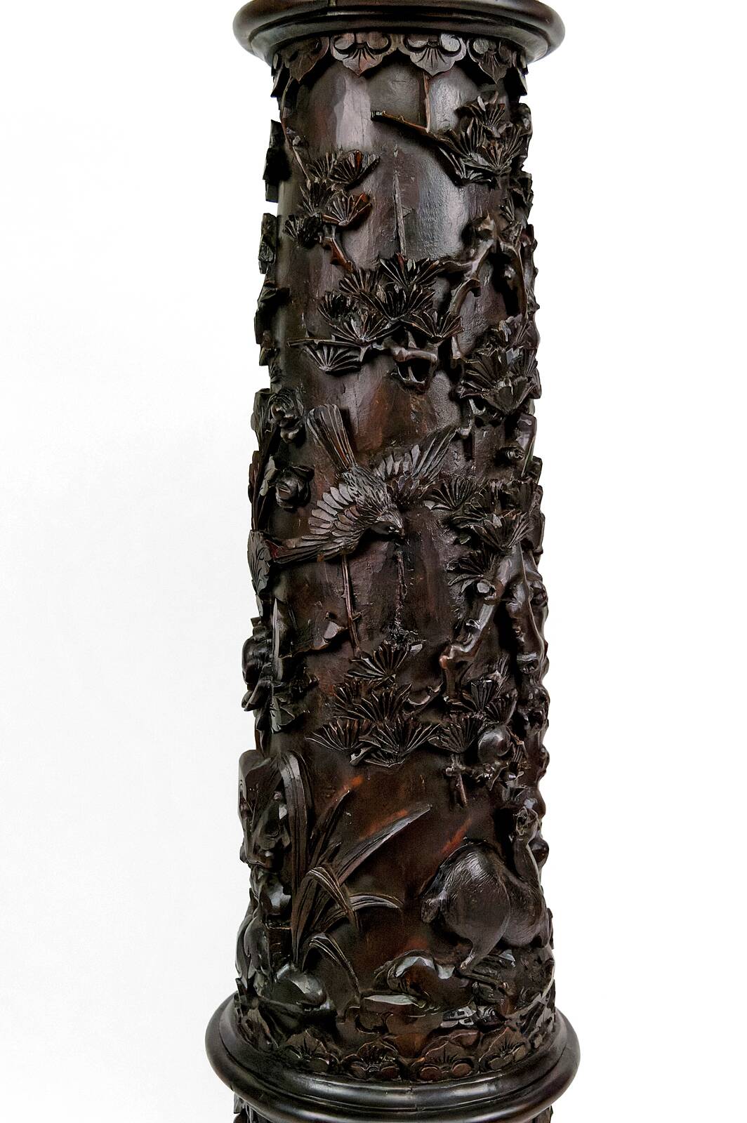 Important high Asian column / saddle in carved wood, circa 1880, Indochina