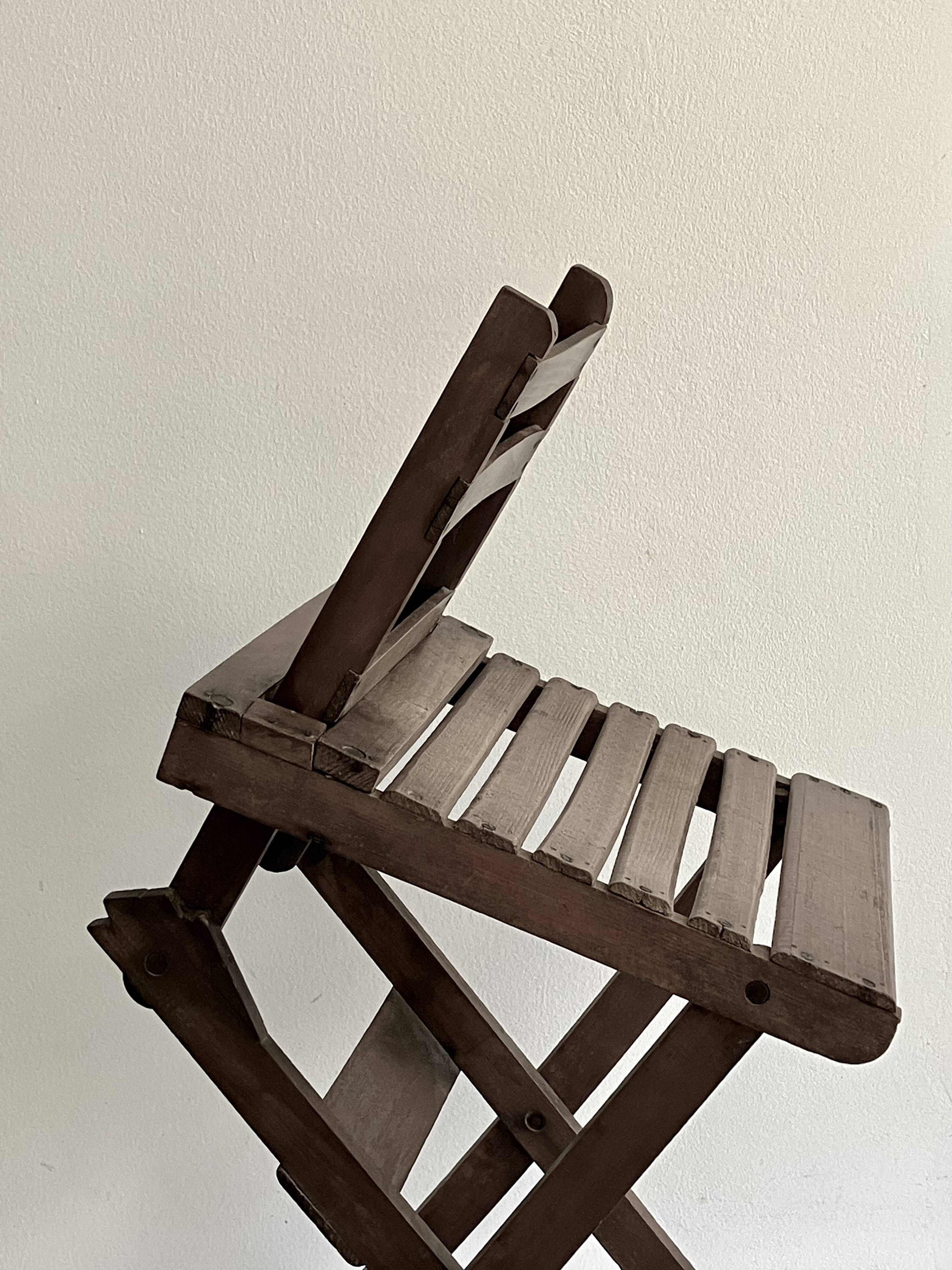 Ancienne chaise pliante avec dossier